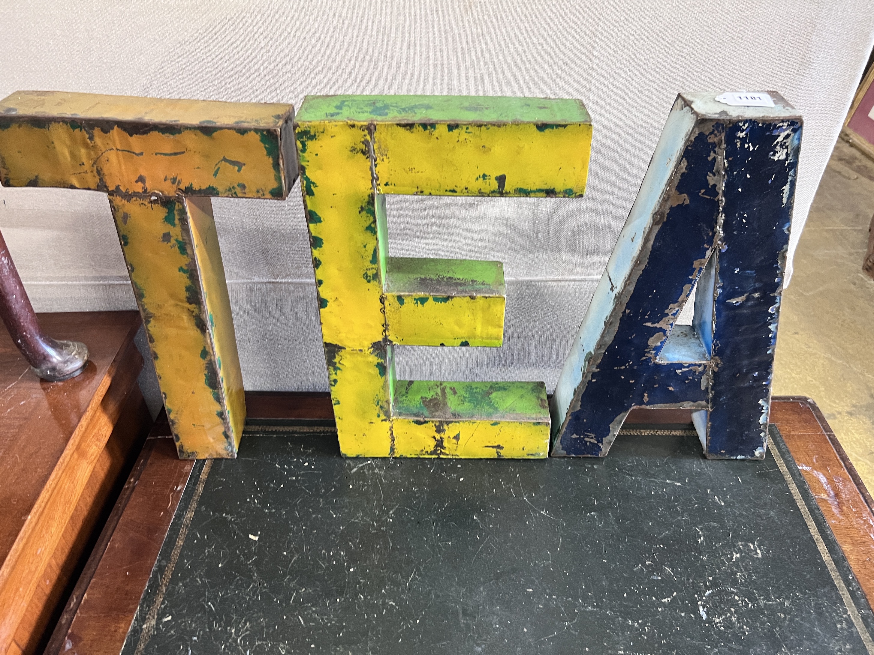 Three painted iron letters spelling TEA, height 50cm